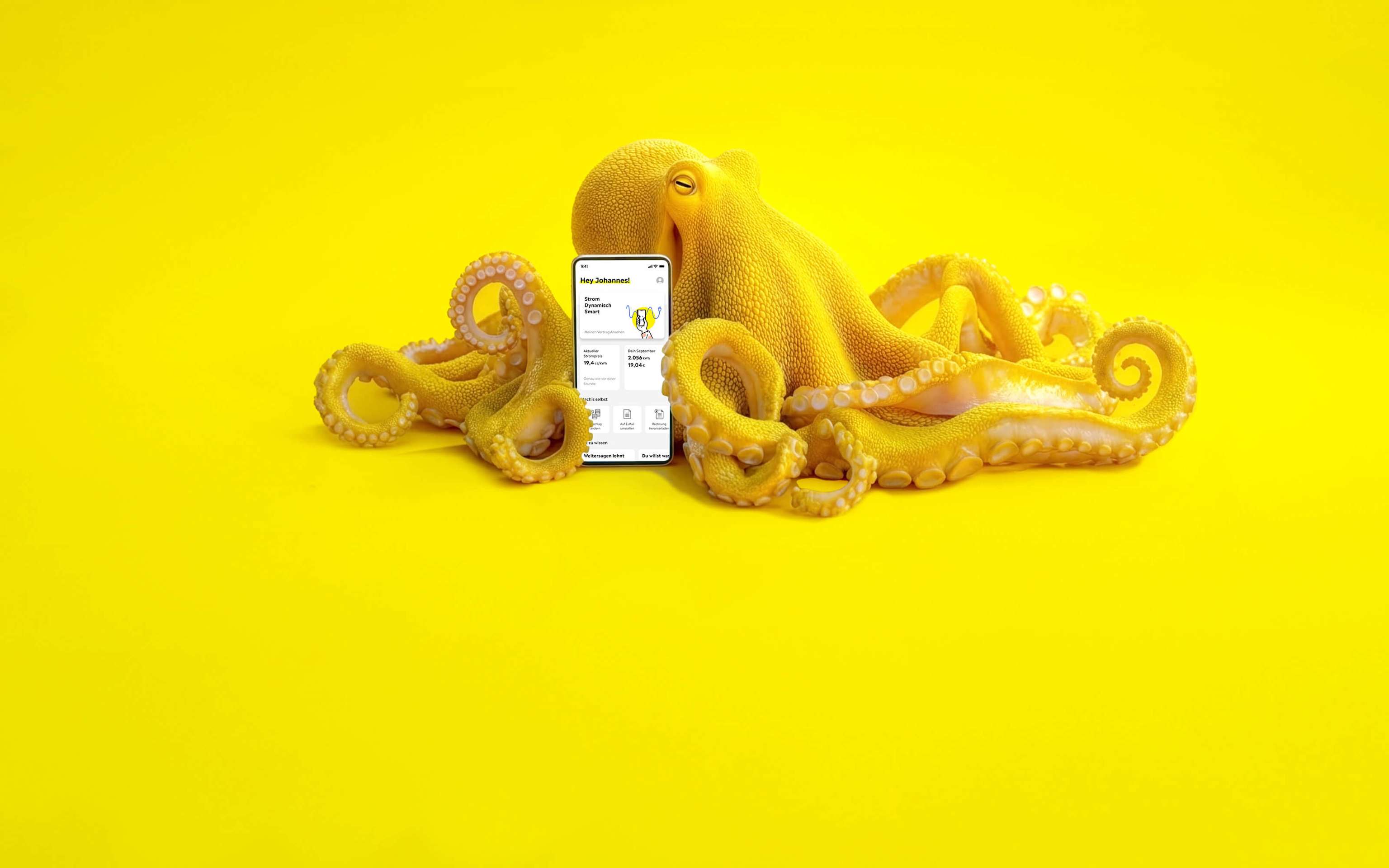 Gelber Oktopus mit einem Smartphone mit Yello App auf dem Bildschirm - KI generiert Gelber Oktopus mit einem Smartphone mit Yello App auf dem Bildschirm - KI generiert